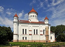 A large white church against a blue sky