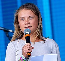 Portrait of Thunberg at Glastonbury in 2022