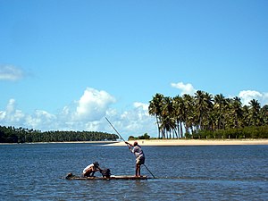 Fishermen at freshwater stream near Tamandaré, PE, Brazil