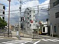 野田駅 - 大阪市場駅貨物支線跡（2009年当時。現在は遊歩道として整備されている）。突き当たりが大阪市中央卸売市場本場（旧大阪市場駅）。