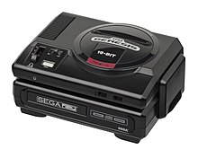 A Sega CD attached to a Sega Genesis.