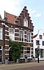 Woning met trapgevel en siermetselwerk in neorenaissance-stijl[1]