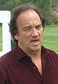 James Belushi interpreta Jim