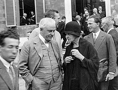 Robert A. Millikan and Marie Curie at Rome Conference on Nuclear Physics.jpg