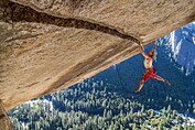 German climber Hans Zak on a granite roof climb in Yosemite