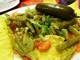 Salad including sliced nopales (opuntia pads)