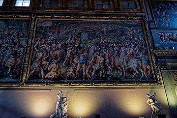 View on the West Wall with huge Battle Frescoes 1494 by Vasari & Assistants II. Site of the never done Battle of Cascina.