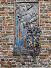 Herdenkingsrelief op de protestantse kerk