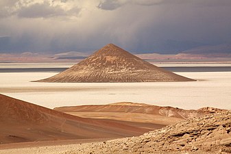 Cono de Arita, a conical sandstone inselberg in the middle of Salar de Arizaro, Argentina