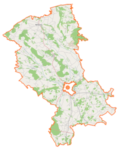 Mapa konturowa powiatu ostrołęckiego, w centrum znajduje się punkt z opisem „Dylewo”