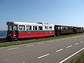 RTM-Triebwagen M1602 mit zwei Personenwagen