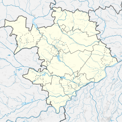 Mapa konturowa powiatu staszowskiego, blisko centrum na prawo znajduje się punkt z opisem „Ossala-Lesisko”