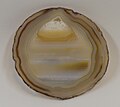 Agate as geological water-level showing top-level criteria from the history of crystallization. Mineral forming was concentric followed by a bottom-up-sequence. Final crystallization occured in the top.