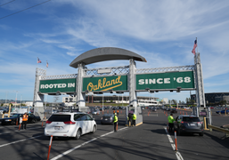 Rooted in Oakland sign at Entrance to Oakland Coliseum.png