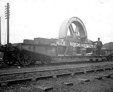 Flatcar loaded with a flywheel 1900.[118]