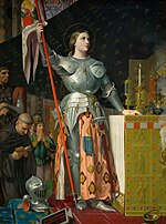 Painting of Joan of Arc in armor holding a flag.