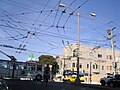 Overhead trolley wires at intersection of two routes in San Francisco