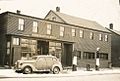 Philip Emin's grocery store, gas pumps, pool room in the 1930s. On Main Street between Commercial Street and Pearl Street.