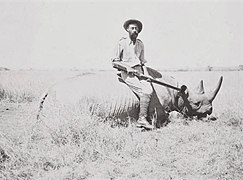 Richard John Cuninghame poses with a killed rhinoceros.jpg