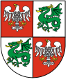 The coat of arms of the Warsaw West County used from 2000 to 2012.