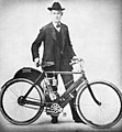 Carl Oscar Hedström with prototype "Indian" motorcycle