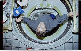 STS077-368-036 - STS-077 - Garneau in connecting tunnel and Spacehab - DPLA - 6b157efe72fbeaf95a47145679880ad6.jpg