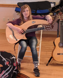 American harp guitarist, conducting a guitar clinic in The Villages, Florida in 2020.