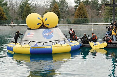 Navy-built, 18,000-pound Orion mock-up in a test pool at the Naval Surface Warfare Center's Carderock Division in West Bethesda, Maryland