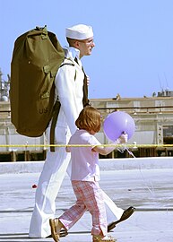 Sailor walks with his duffel bag, 2002.