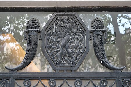 Art Deco volutes on some ironwork of Avenue des Champs-Élysées no. 77 in Paris, unknown architect, (c. 1930)