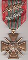 Croix de guerre 1939-1945 avec six citations, 1 palme de bronze, 1 palme d'argent.