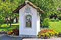 English: Wayside shrine with alcove painting of “the good shepherd” Deutsch: Bildstock mit der Nischenmalerei „Der gute Hirte“