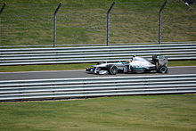 Lewis Hamilton driving into the pit lane