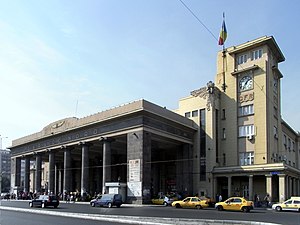 Intrarea principală a Gării Nord, București, 1935, de Victor Gh. Ștephănescu[133]