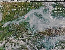 Several wildfires between about 62°N and 69°N in Alaska, USA, and the Yukon Territory, Canada - July 22nd, 2019 (48353225597).jpg