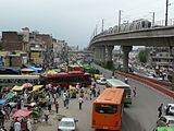 B3 The Delhi Metro rapid transit system and the low-floor CNG buses. Infrastructure in India in the next five years is estimated to bring in $1 trillion in investment, half of it by India's private sector.