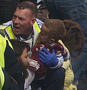 Boston Marathon explosions (8652911863) (child being held).jpg