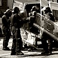 British police officers in riot gear