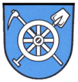 Pickhacke und Spaten (belegt mit einem Rad, Wappen von Möglingen)