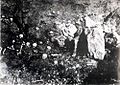 Soldiers holding the skulls of victims of the Armenian Genocide.