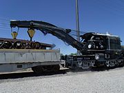 Railroad Steam Wrecking Crane and Tool Car. It is also known as Southern Pacific Railroad Nos.: SPMW 7130/SPMW 7131.