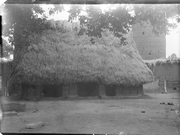 Igbo house with tower in the background