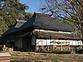 釘町家住宅の茅葺きトタン覆い屋根