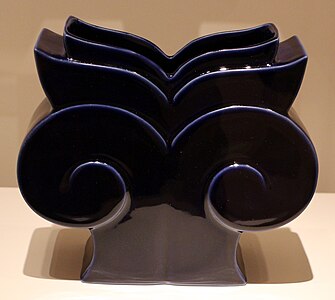 Postmodern volutes of a vase inspired by the Ionic capital, designed by Michael Graves for Swid Powell, 1989, glazed porcelain, Indianapolis Museum of Art, Indianapolis, US[16]