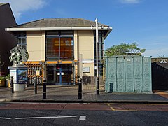 The station frontage on Vyse Street, with to the right a grade II listed cast-iron urinal.