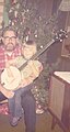 Paul learning the banjo