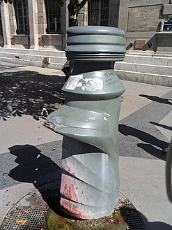 One of the five Millenium fountains installed throughout Paris in 2000. This fountain is situated on the corner of the Rue d'Arcole and the parvis.