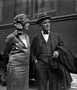 Greta and Robert A. Millikan at a train station.jpg