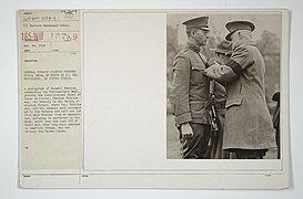 Decorations - Presentations - DSM and CM of Honor - General Edwards pinning Congressional Medal of Honor on Lieutenant Colonel Whittlesey, on Boston Common - NARA - 26433219.jpg