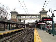 A railway station with two high-level side platforms